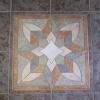 Geo Burst Tile Design:  This is a 2'x2' geometric using 5 colors and has its own border.  SOLD. Approximate price $250.**